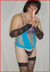 Tiny-dicked sissy Olesya sucks realistic dildo