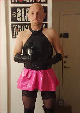 Tragic sissy loser Nico wearing a stupid pink latex miniskirt