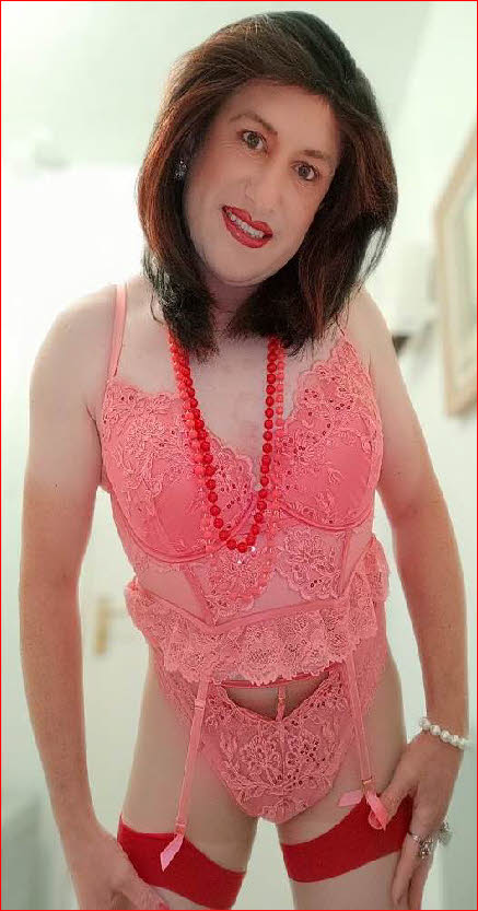 Effeminate transvestite Elizabeth wears slutty pink lingerie