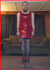 Male sissy slave Shaun in sparkly red dress