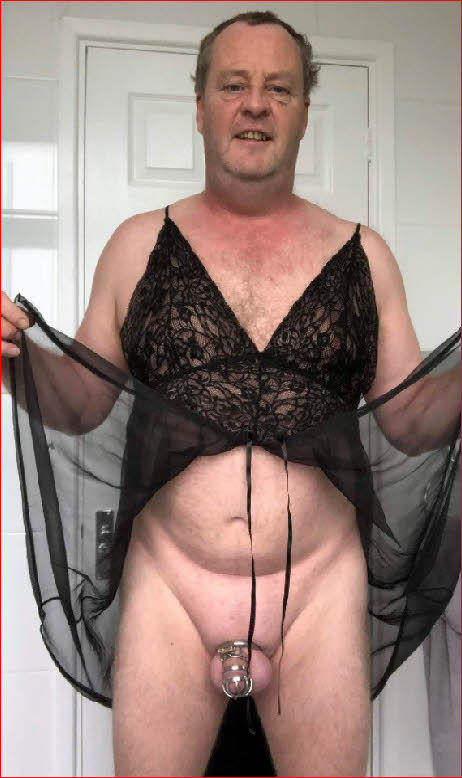 Sissy Jeffrey Mitchell displays his tiny caged cock