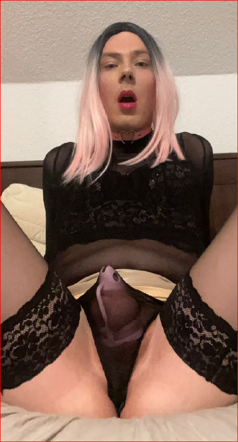 Sissy slut Sophia wearing a cock cage beneath his black knickers