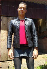 Sissy Joanne fully exposed in black leather skirt