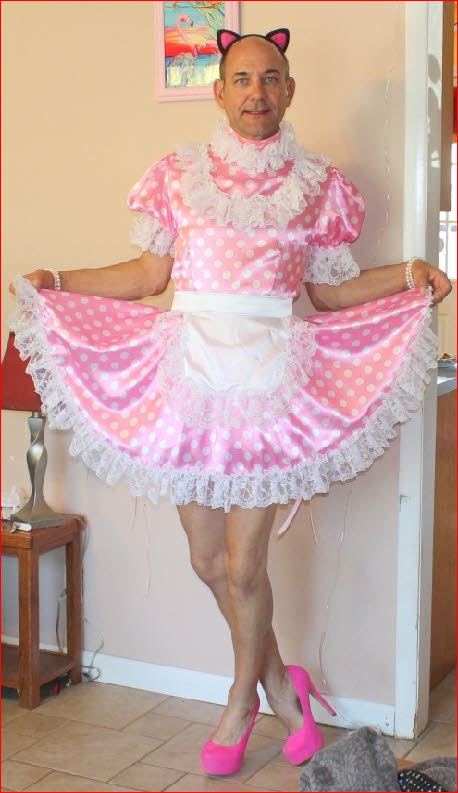 Transvestite Michelle from Ohio mincing around in a sissy pink fairy dress